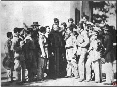 Fr. d’Alzon, with Mr. Germer-Durand, surrounded by students